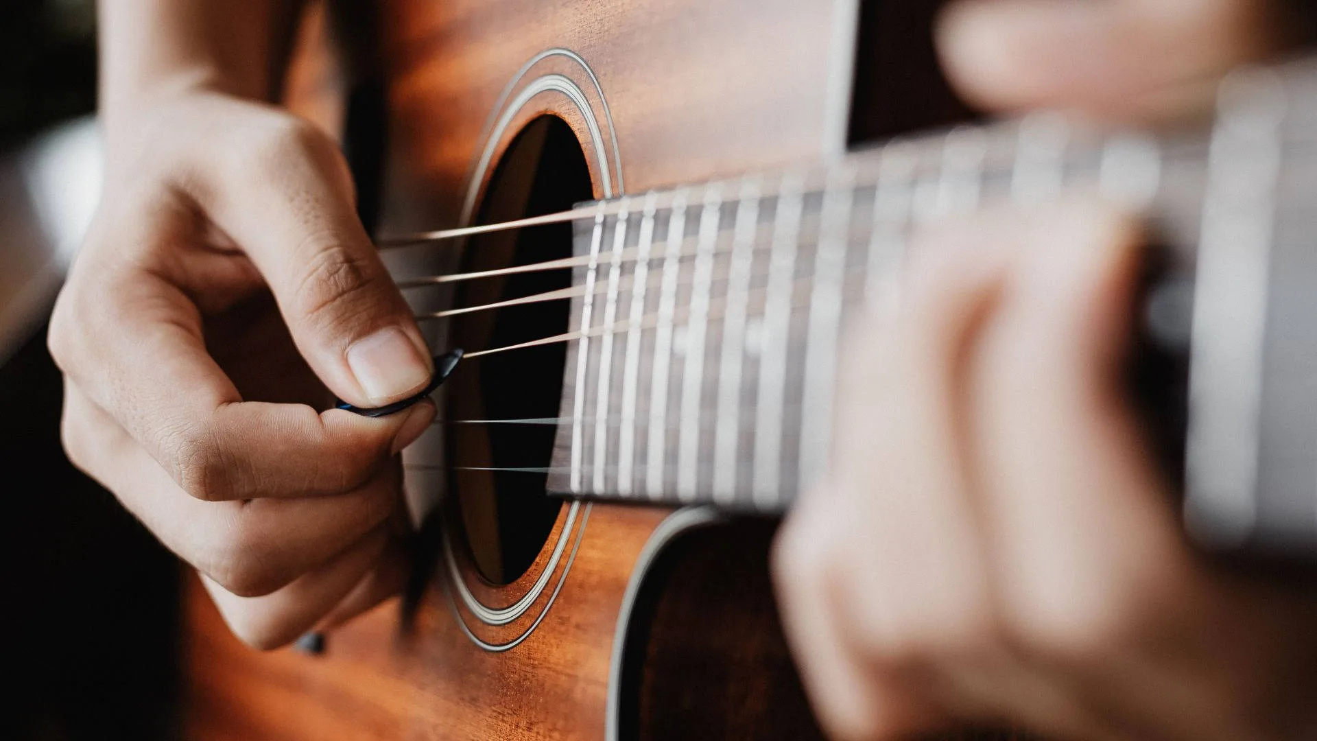Download Acoustic Guitar Hands Strumming Wallpaper