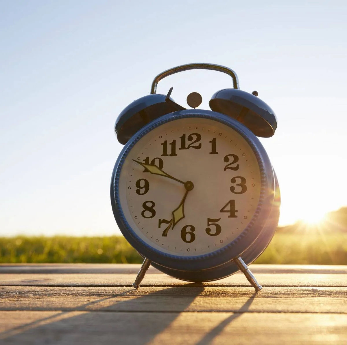 Download Blue Alarm Clock Telling Time Wallpaper