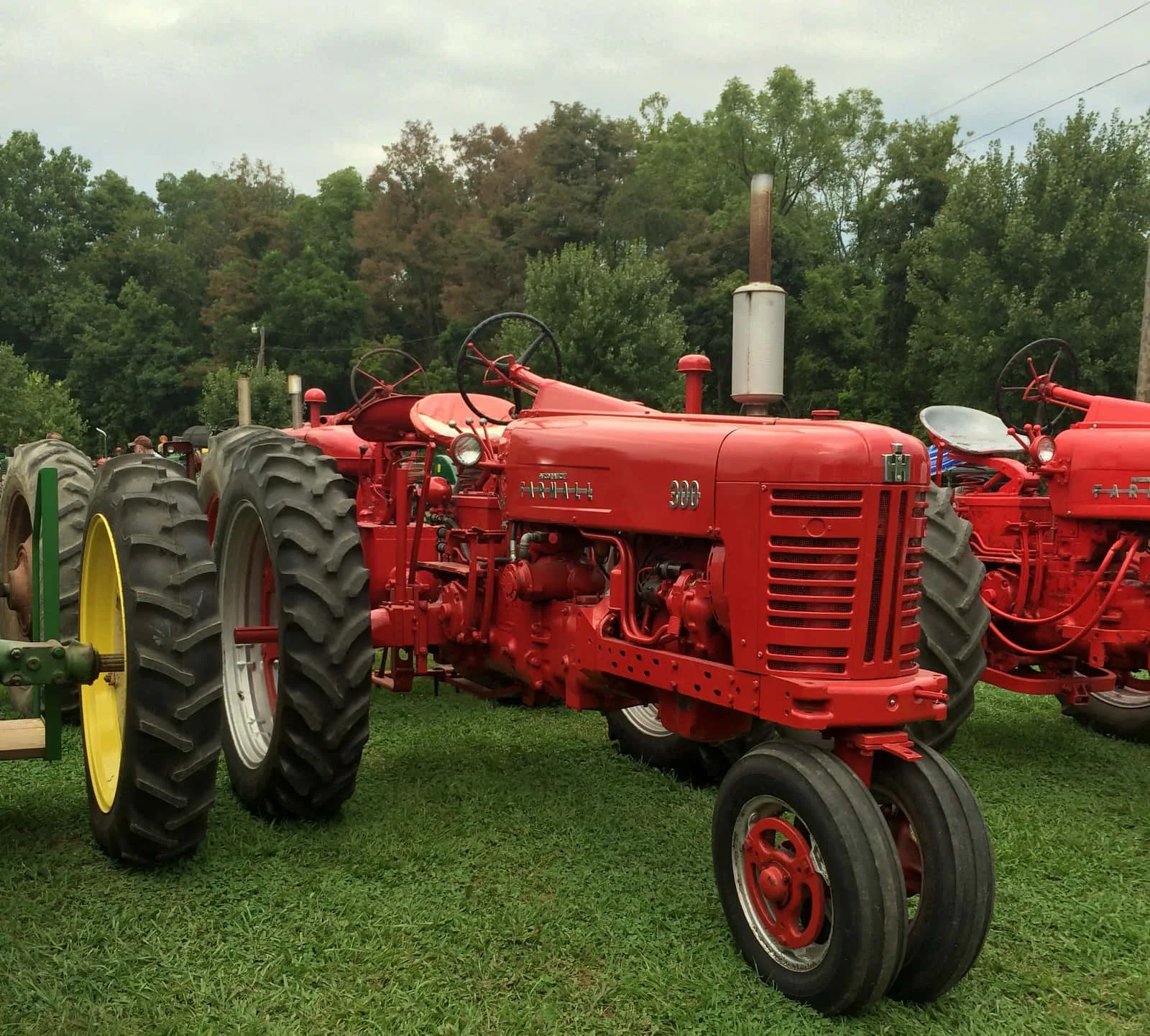 Download Caption Powerful Agriculture Tractor On A Farm