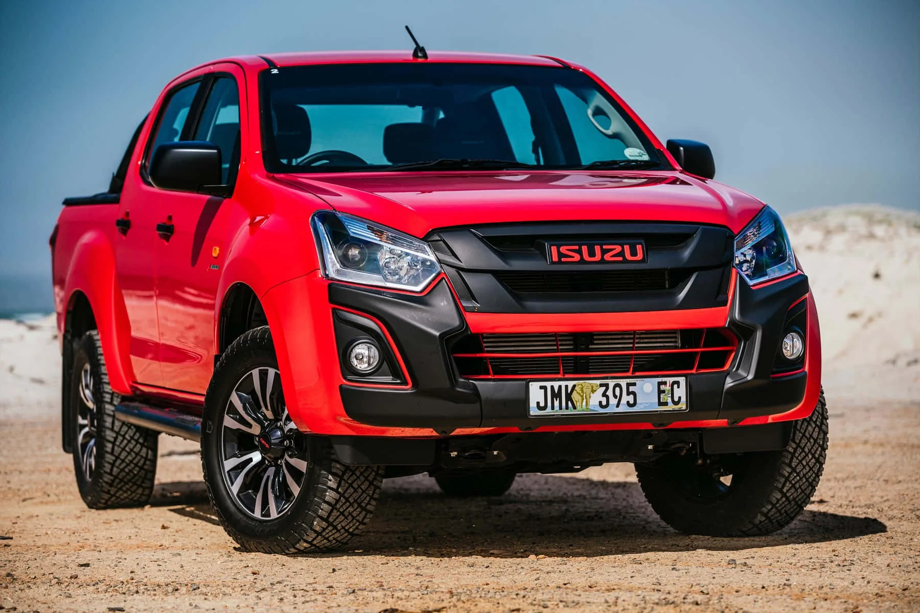 Download Isuzu Truck On The Road Wallpaper