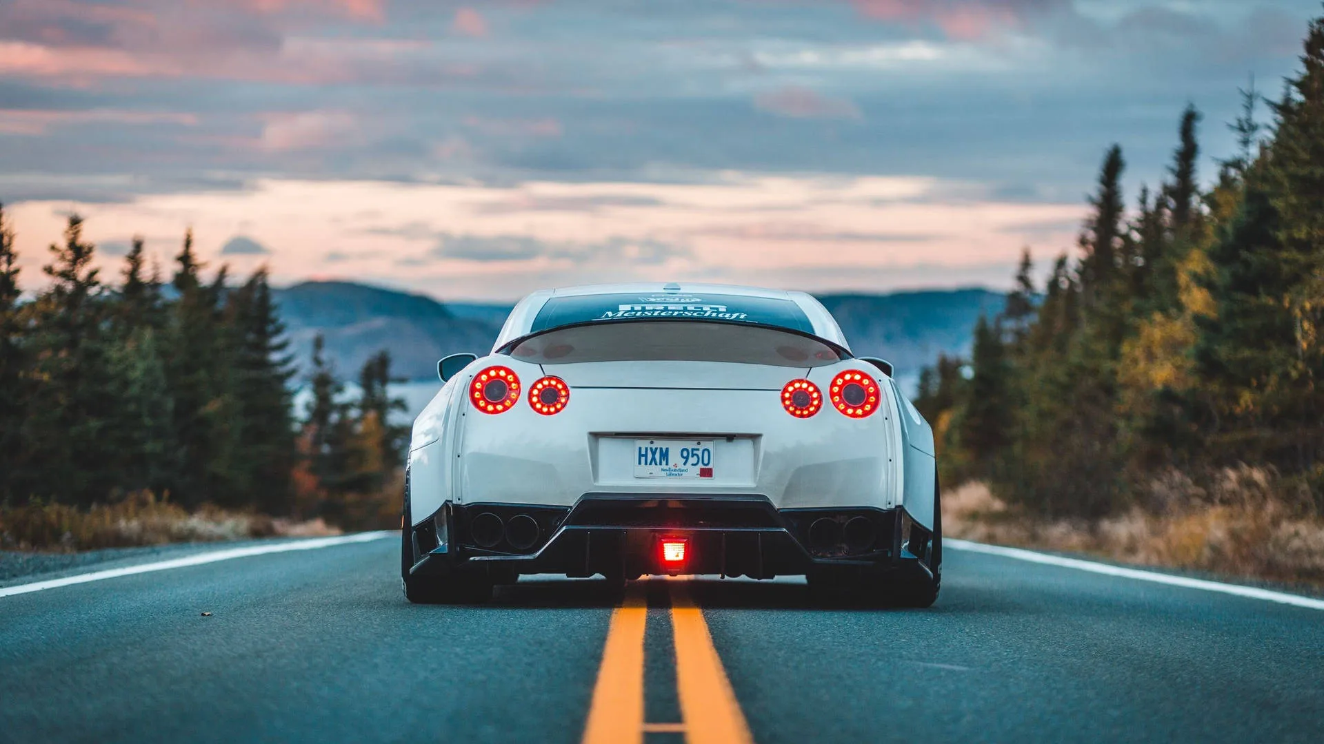 Download Rear Angle White Car Wallpaper