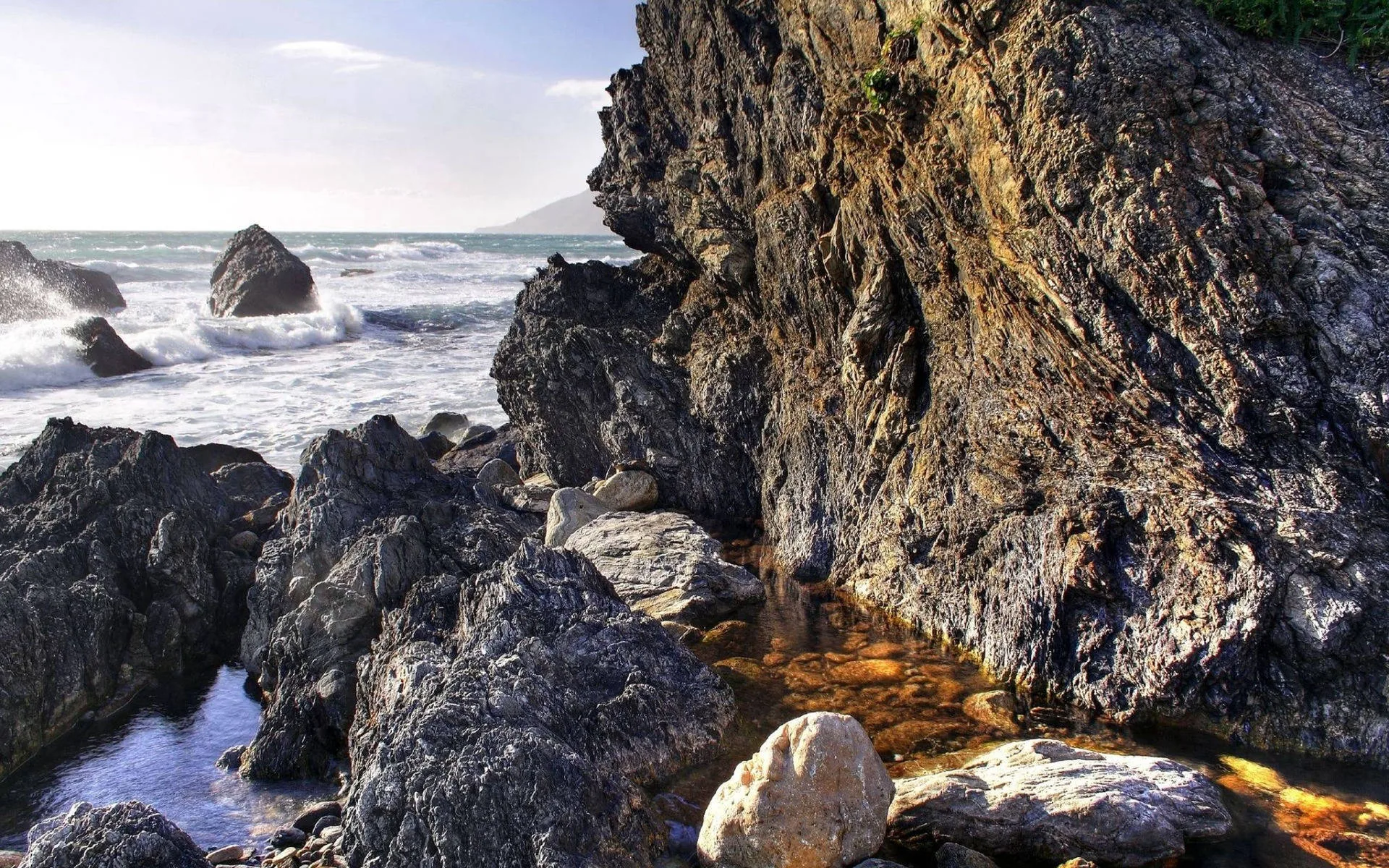 Download Rocks Along The Coast Wallpaper