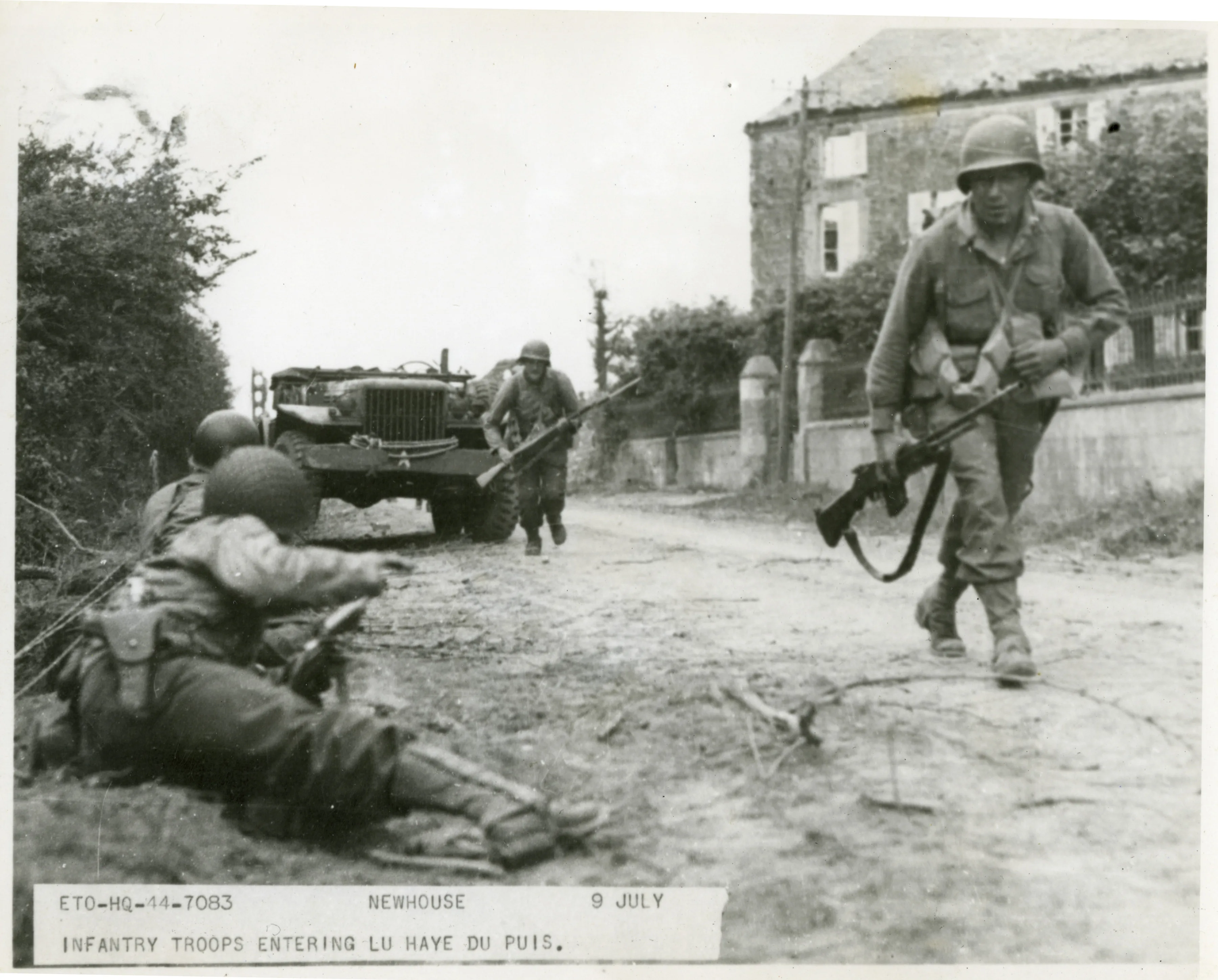 Infantrymen Entering A French Town In July 1944 The Digital Collections Of The National Wwii