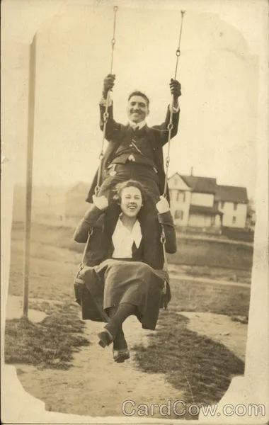 Man And Woman On A Swing Couples