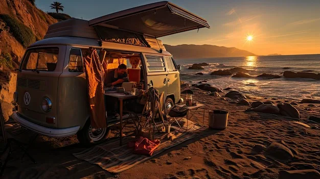 Premium Ai Image A Camper Van Is Parked On A Beach With The Sun Setting Behind It
