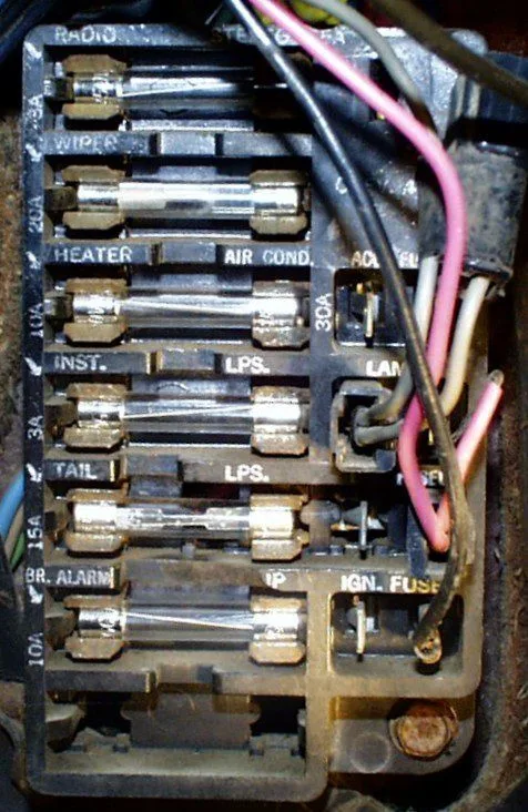 The Inside Of An Electrical Box With Many Wires And Other Parts Attached To Each Side